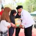 Gelar Gerakan Pangan Murah Bupati Kukar Serahkan bantuan Beras