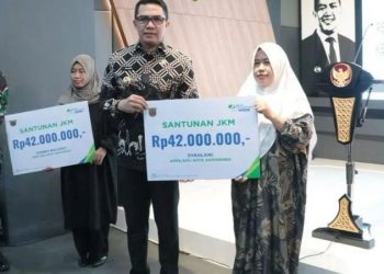 Serah Terima Asuransi BPJS JKM Anggota KPPS, Dana Rp 42 Juta Diterima Ahli Waris